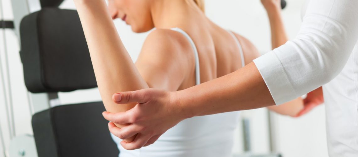 Patient at the physiotherapy making physical exercises